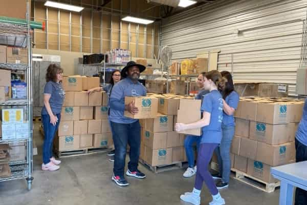 volunteers loading supplies